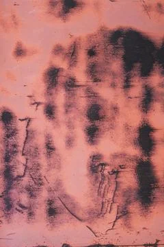 Background texture. Aged metal rusty surface with peeling, faded red orange p Stock Photos