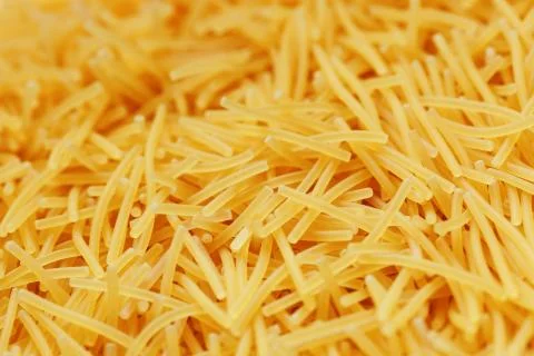 Background texture and pattern of boiled egg noodles or spaghetti pasta in fu Stock Photos