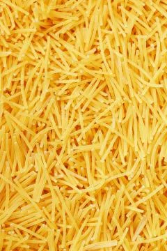 Background texture and pattern of boiled egg noodles or spaghetti pasta in fu Stock Photos