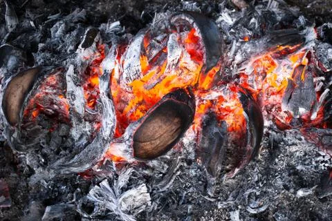 Background texture of ash from burning a coconut shell bonfire. Stock Photos