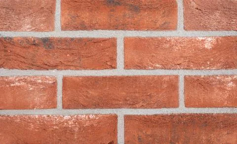 Background from the texture of a beautiful red brick Stock Photos