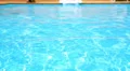 Background Texture of Blue Azure Water in the Open Air Pool. Summer Day. HD Footage