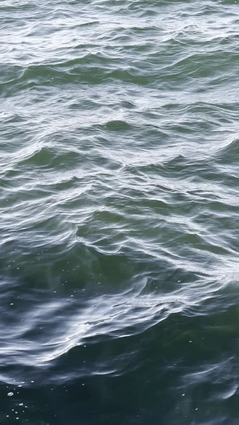 Background texture blue green water in the sea small waves glare Stock Footage 241004905