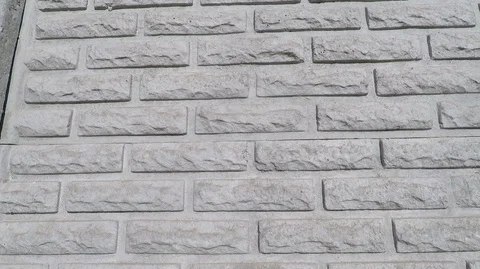 Background texture brick fence of molded concrete sections Stock Footage 127711510