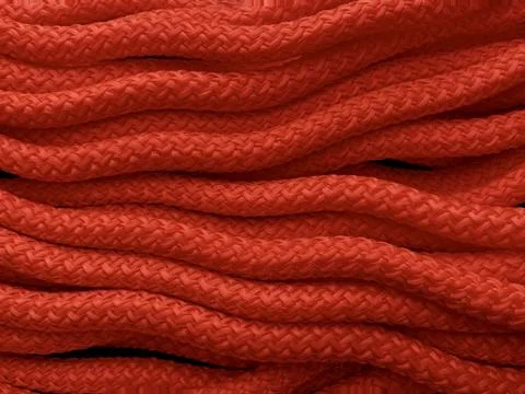 Background texture: bright nylon rope. Tight industrial rope. Stock Photos