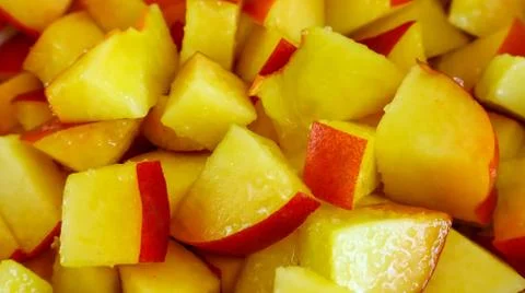 Background texture bright yellow cut fruit peach close-up Foto stock