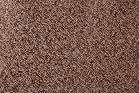 Background texture of brown bumpy handmade paper Stock Photos
