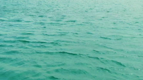 Background texture calming ocean top view. Flight over green waves tropical sea. Stock Footage 253394758