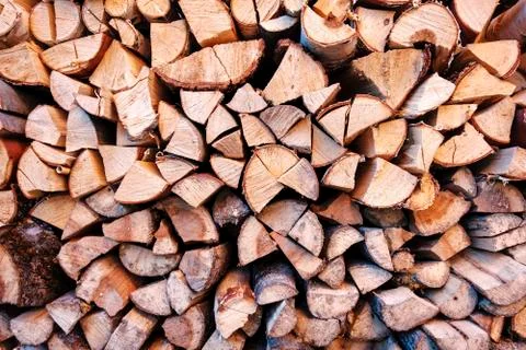 Background texture of chopped wood in a stack Stock Photos