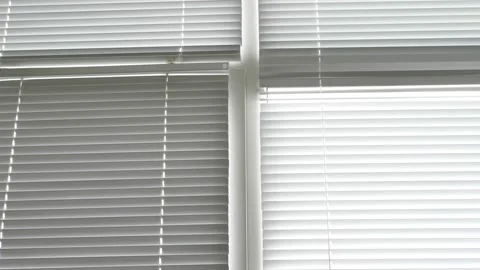 Background texture. closed white aluminum blinds on windows Vídeo Stock 145538293