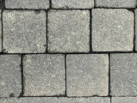 Background texture of cobblestone or paving slabs, pavement, in Bandung Stock Photos