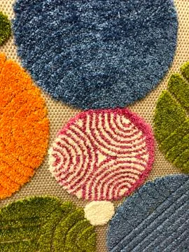 Background, texture of colored carpet with color pattern. Used for floors Stock Photos