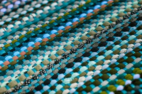 Background, texture of colored handmade carpet. Stock Photos