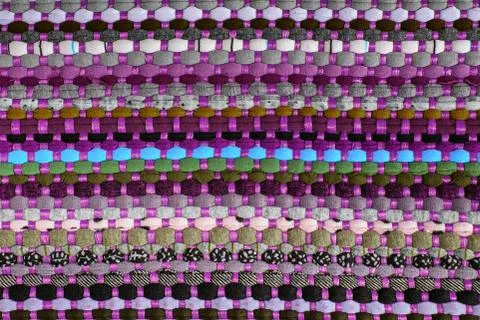 Background, texture of colored handmade carpet Stock Photos