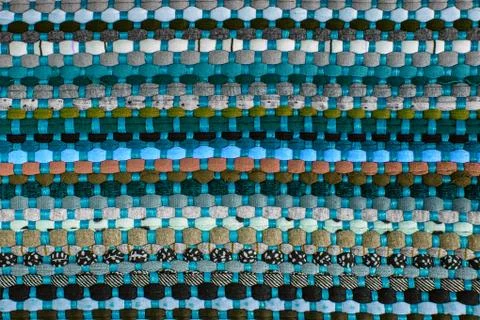 Background, texture of colored handmade carpet Stock Photos