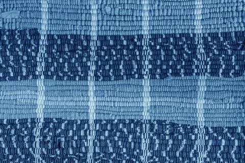 Background, texture of colored handmade carpet. Stock Photos