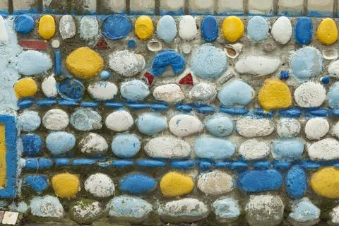 The background texture of colored stone wall Stock Photos