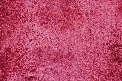 Background, texture of concrete and stone in the color of 2023 viva magenta Stock Photos