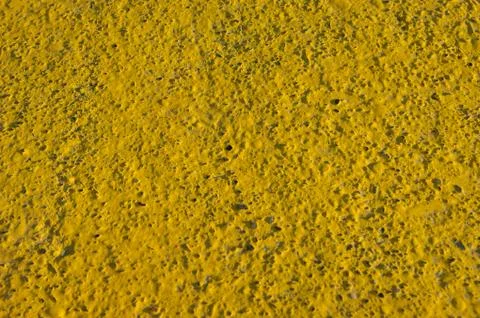 Background, texture - concrete wall, yellow. Rough surface Foto stock