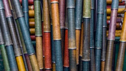 Background texture. Cone for a bobbin with wool. Traditional woolen factory. Stock Photos