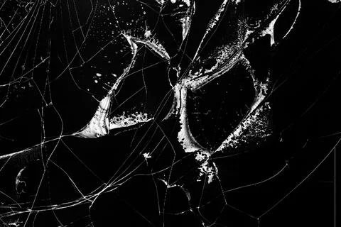 Background texture cracks on the broken screen of a liquid crystal display, c Stock Photos