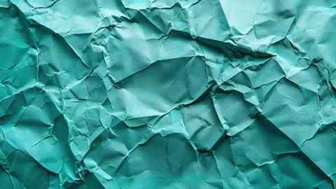 Background of a texture of a crumpled paper leaf in motion. Blank space for text Stock Footage 276499664