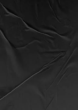 Background texture of crumpled thin black paper Stock Photos