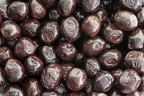Background texture of cured grade A black olives Stock Photos
