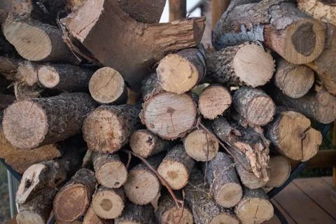 Background texture of cut dried logs for firewood Stock Photos