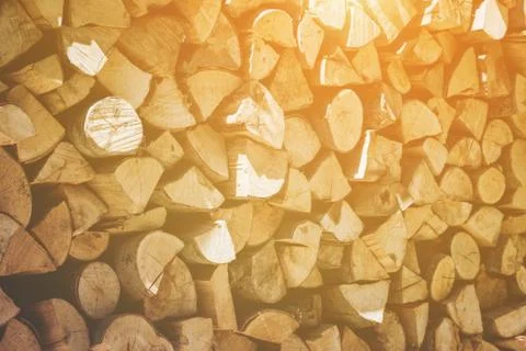 Background texture of dried cut and split logs Foto stock