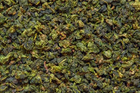Background texture of dry green Tie Guan Yin Oolong tea Foto stock