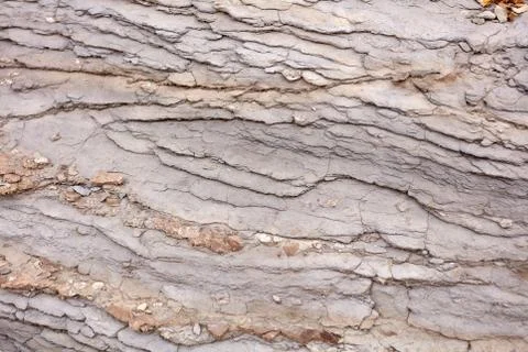 Background texture of exposed eroded rock strata Stock Photos