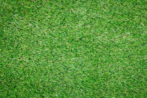 Background texture with fake grass. Stock Photos