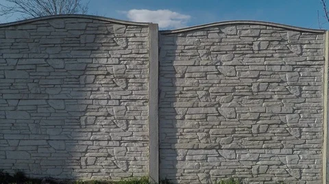 Background texture fence from sections against the sky drawing sandstone Stock Footage 127704833