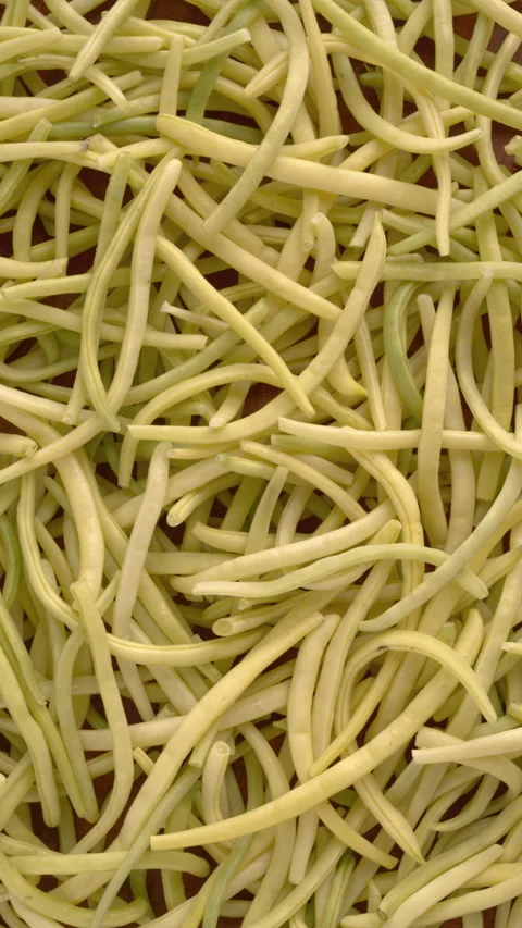 Background texture of freshly harvested yellow French beans. Video stock 342145048