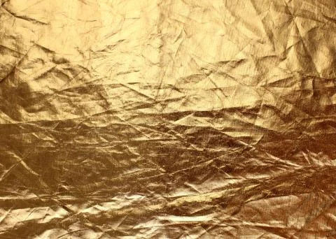 Background texture gold with shiny dented fabric Foto stock