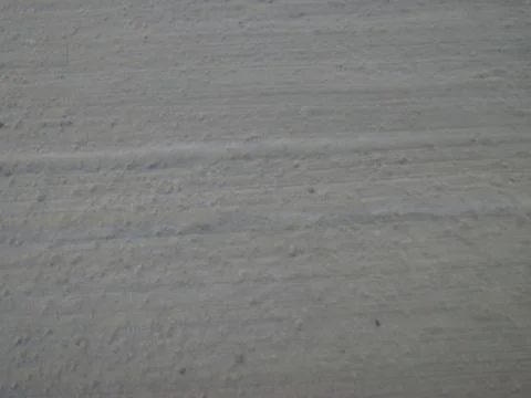 Background The texture of the gray wall of a house made of cement Stock Photos