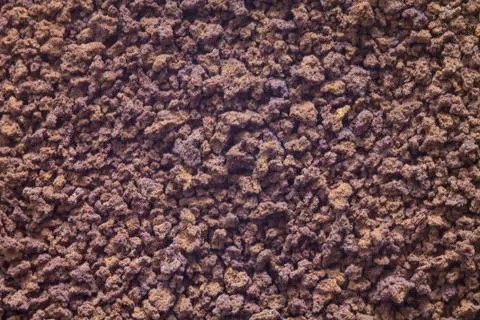 Background of a texture of ground coffee Stock Photos