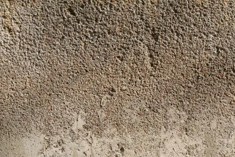 Background of the texture of a light concrete wall. Stock Photos