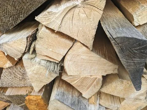 Background, texture of logs, firewood close-up. Stock Photos
