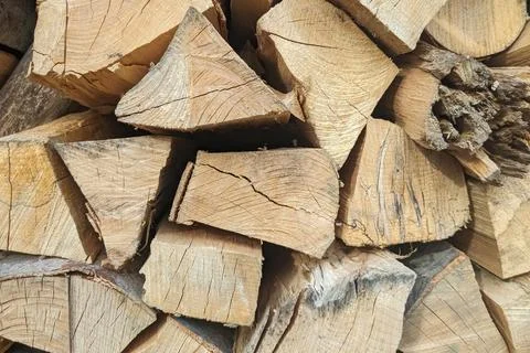 Background, texture of logs, firewood close-up. Stock Photos