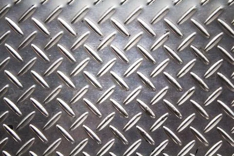 Background texture of metal diamond plate. Stock Photos