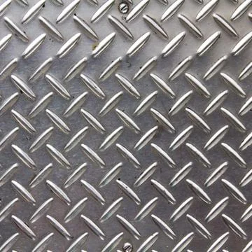 Background texture of metal diamond plate. Stock Photos