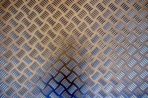 Background texture of metal with repetitive pattern 写真素材
