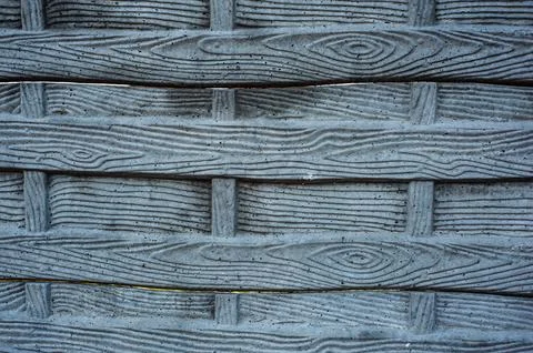 Background the texture of a modern gray concrete wall made of blocks, fence,  Foto stock