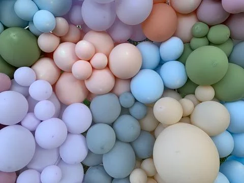 Background texture: Multicolored inflatable balls. Festive background of ge.. Stock Photos