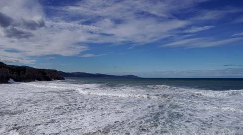 Background . texture. ocean, waves, blue sky Stock Photos