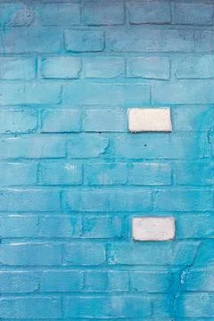 Background texture of a old blue brick wall. Stock Photos
