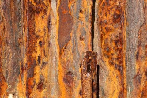 Background texture of old distressed iron panels covered in rust Stock Photos