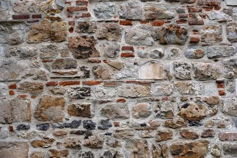 Background texture of old medieval stone wall Stock Photos